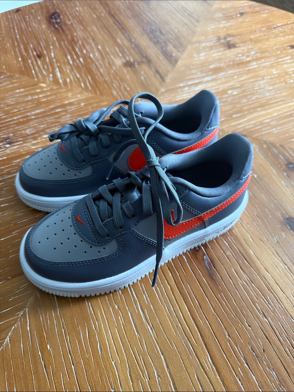 Brand New Nike Kids Dark Gray Sneakers with Orange Accent